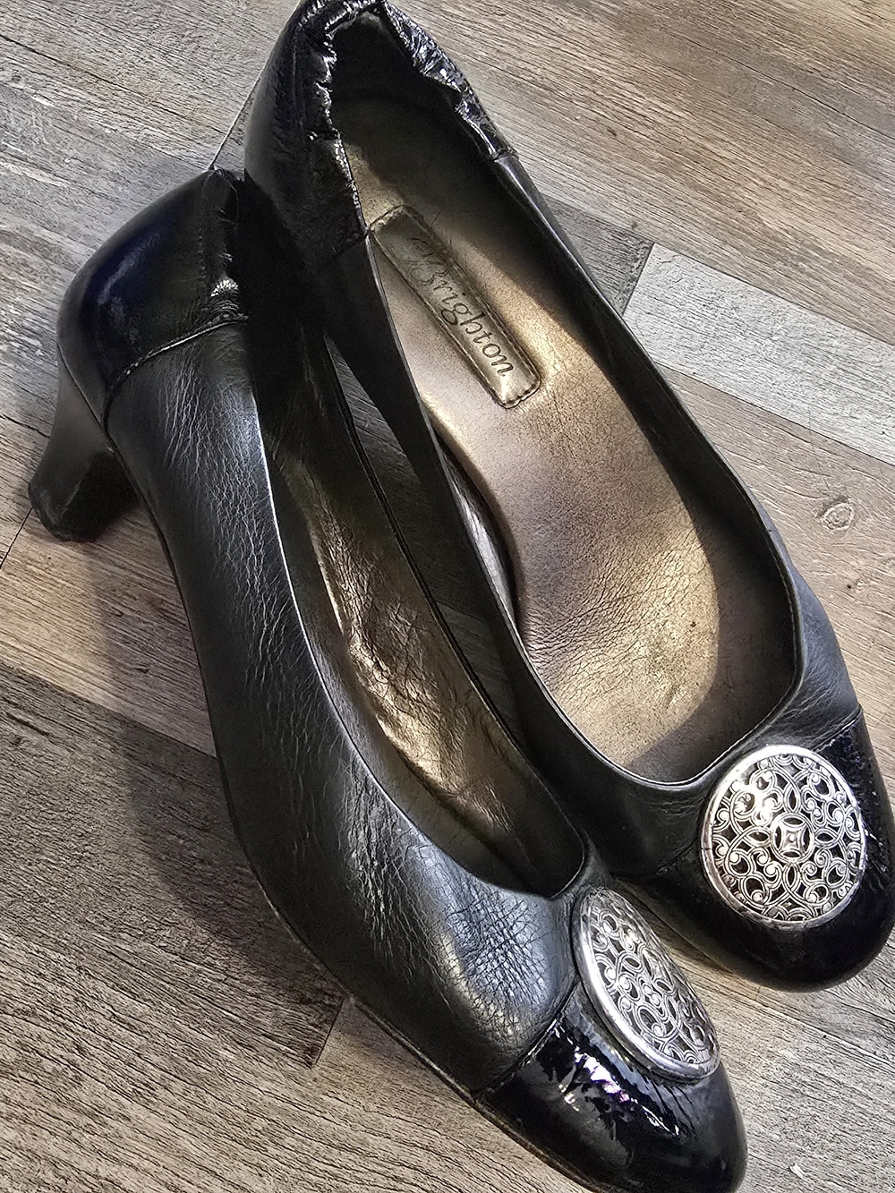 Brighton Black Leather Mid Heel Pumps with Silver Medallion